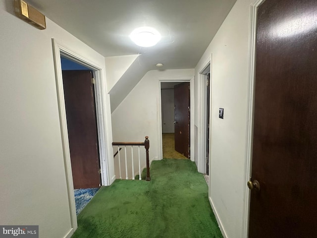 hallway with dark carpet