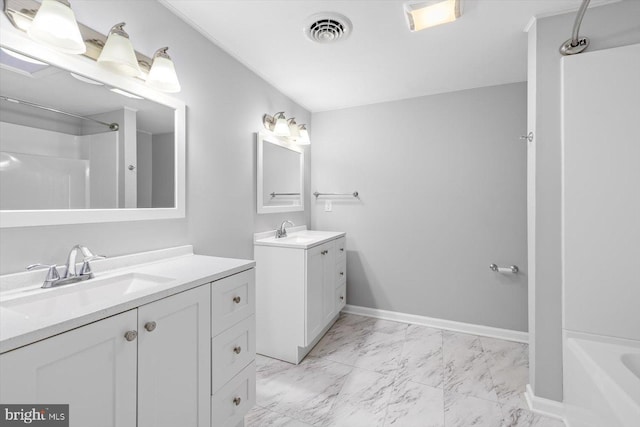 bathroom featuring vanity and shower / bathing tub combination