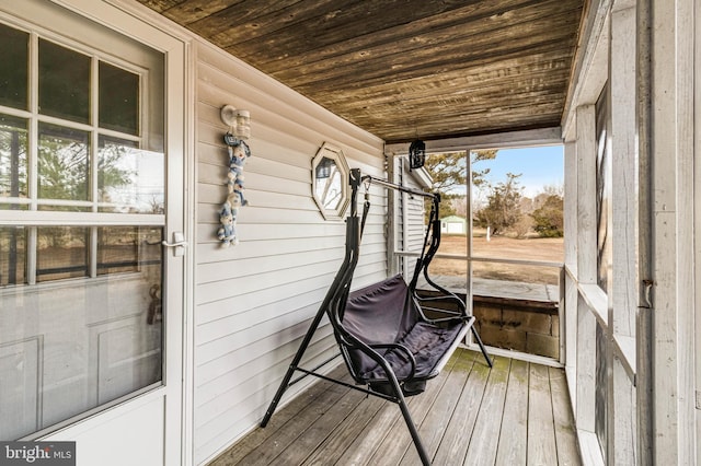 wooden terrace featuring a porch