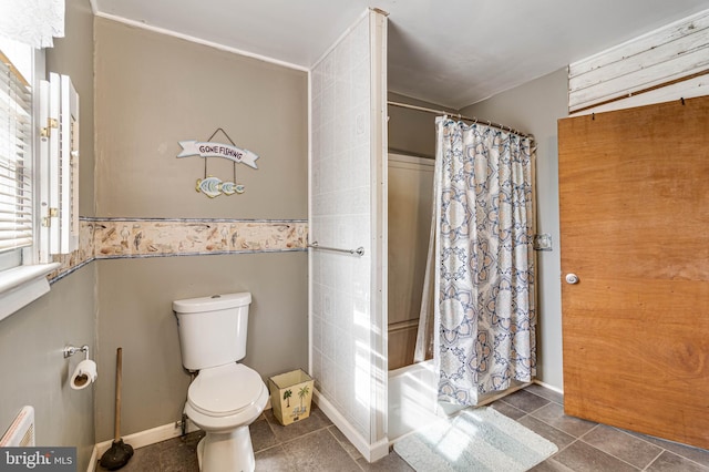 bathroom with toilet, tile patterned flooring, and shower / tub combo