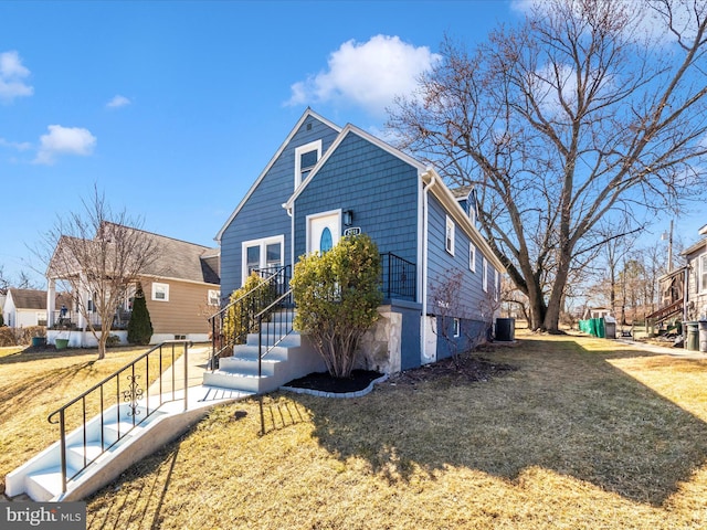 view of front of house with a front lawn