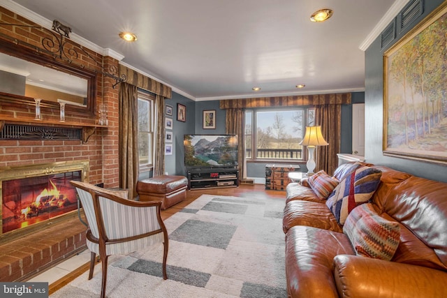 living area with ornamental molding, visible vents, and a fireplace