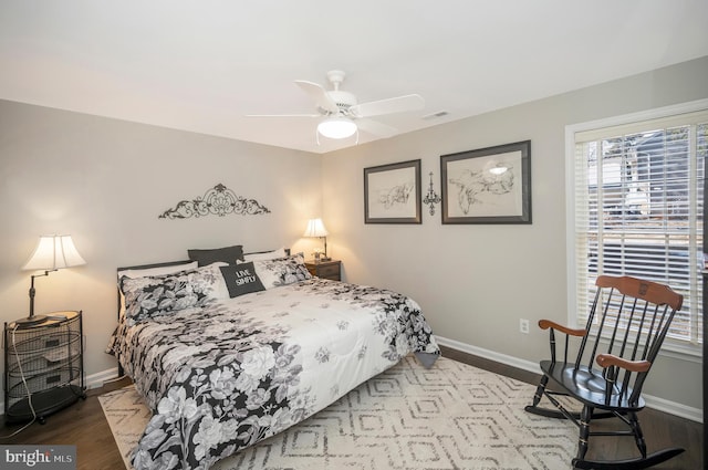 bedroom featuring ceiling fan and light hardwood / wood-style floors