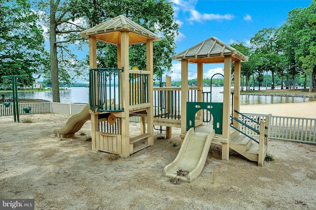 view of playground featuring a water view