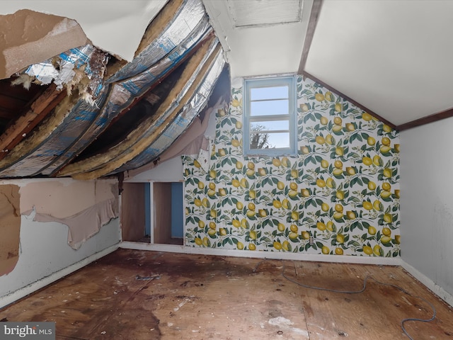 bonus room featuring vaulted ceiling