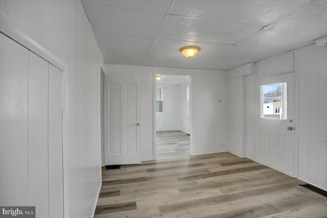 entryway featuring light hardwood / wood-style floors and a healthy amount of sunlight