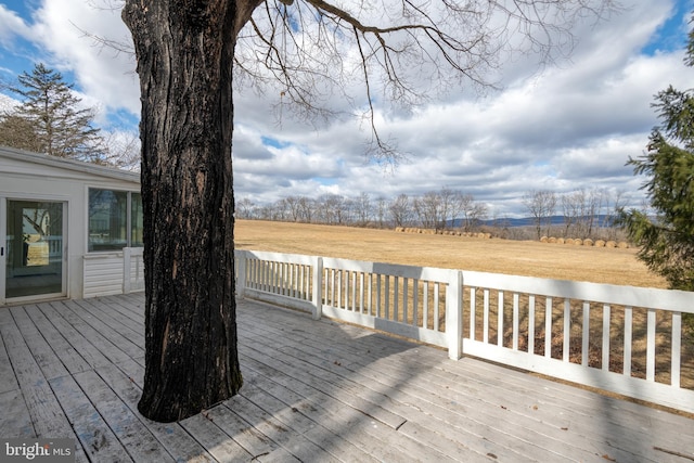 deck featuring a rural view