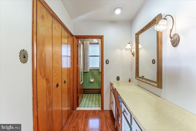 hallway featuring dark hardwood / wood-style floors