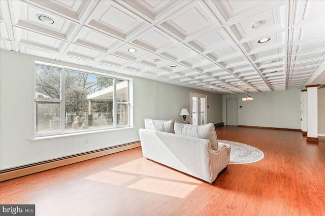 living room with coffered ceiling, hardwood / wood-style floors, and baseboard heating