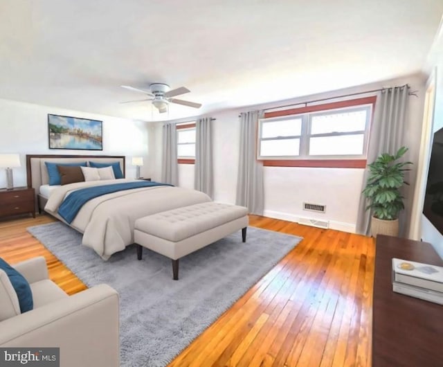 bedroom with hardwood / wood-style flooring and ceiling fan