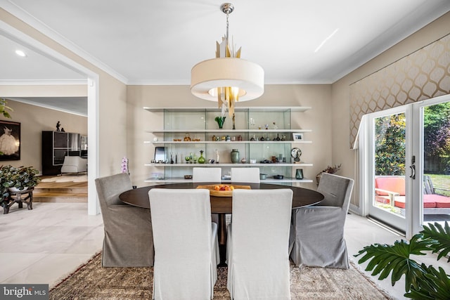 dining room with crown molding