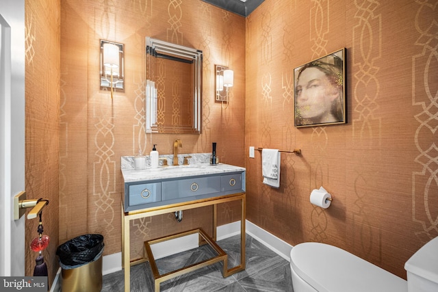 bathroom with vanity and toilet