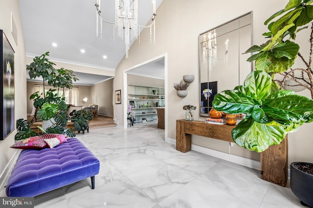 entryway featuring ornamental molding