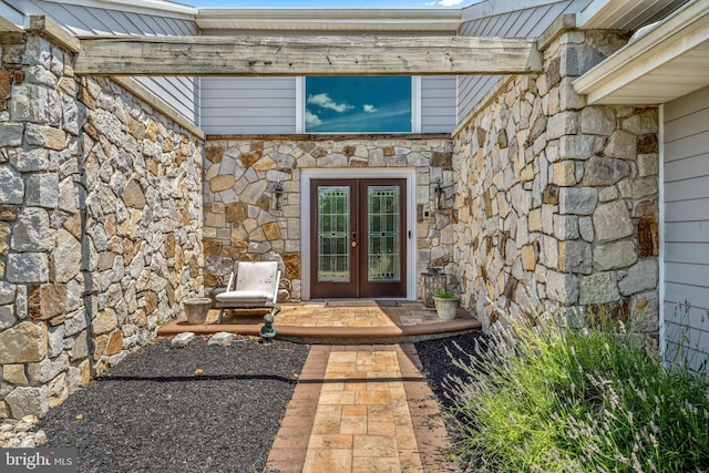 property entrance featuring french doors