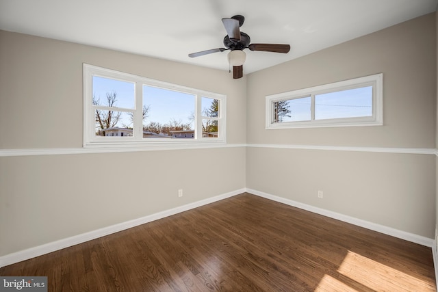 empty room featuring wood-type flooring and ceiling fan