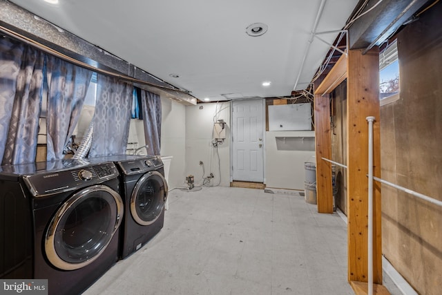 laundry room featuring separate washer and dryer