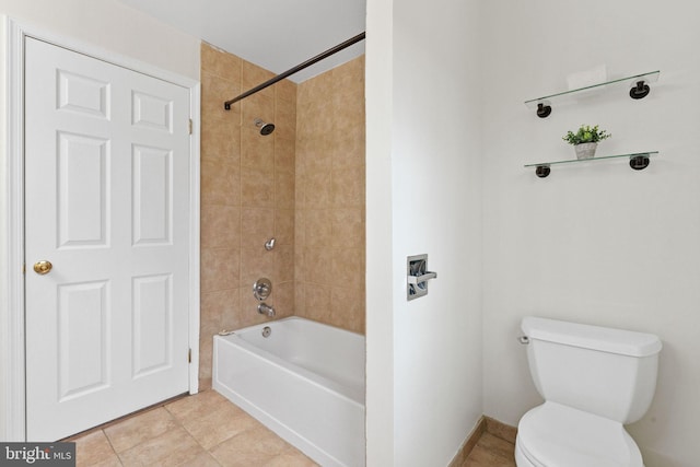 full bath with bathing tub / shower combination, toilet, and tile patterned floors