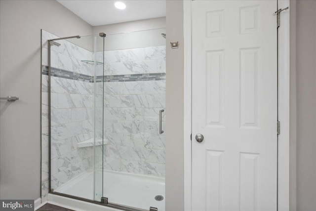 bathroom with an enclosed shower