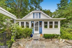 view of front of property with a patio