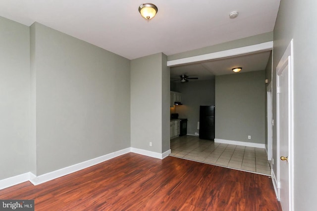 1812 Mcculloh St, Baltimore, MD 21217 - empty room with wood finished floors, ceiling fan, and baseboards