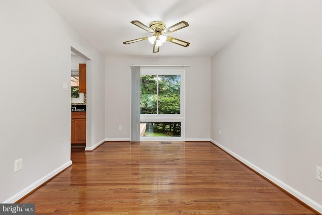 11501 Piney Lodge Rd, North Potomac, MD 20878 - empty room with ceiling fan, light wood-style floors, and baseboards
