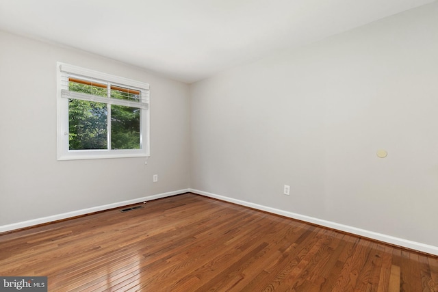 11501 Piney Lodge Rd, North Potomac, MD 20878 - unfurnished room with baseboards and wood finished floors