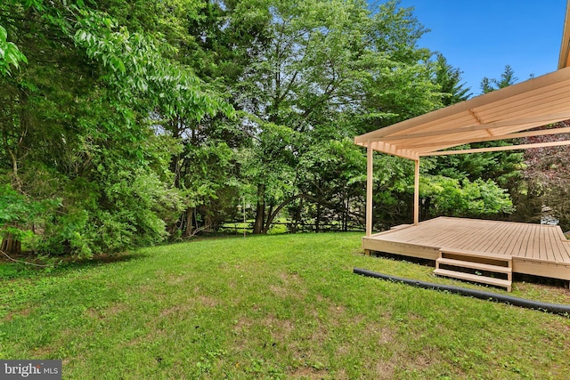 11501 Piney Lodge Rd, North Potomac, MD 20878 - view of grassy yard with a deck