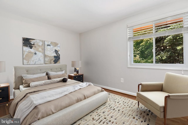 11501 Piney Lodge Rd, North Potomac, MD 20878 - bedroom with baseboards and wood finished floors