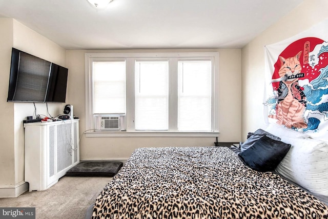 carpeted bedroom with multiple windows and cooling unit