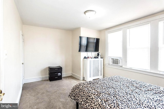 carpeted bedroom featuring cooling unit