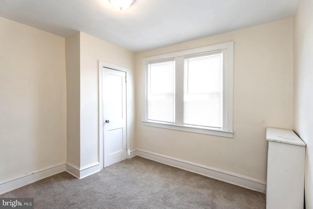 view of carpeted spare room