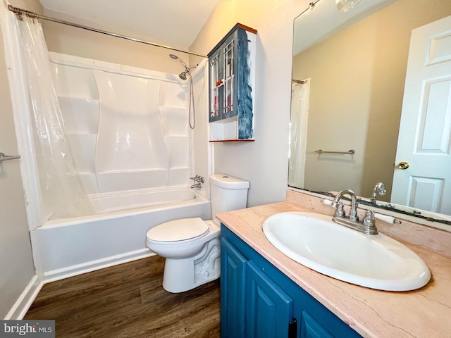 full bathroom with vanity, wood-type flooring, toilet, and shower / bath combo