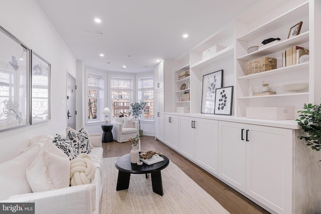 living room with dark wood-type flooring