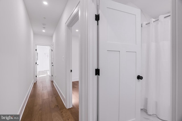 hallway featuring light hardwood / wood-style floors