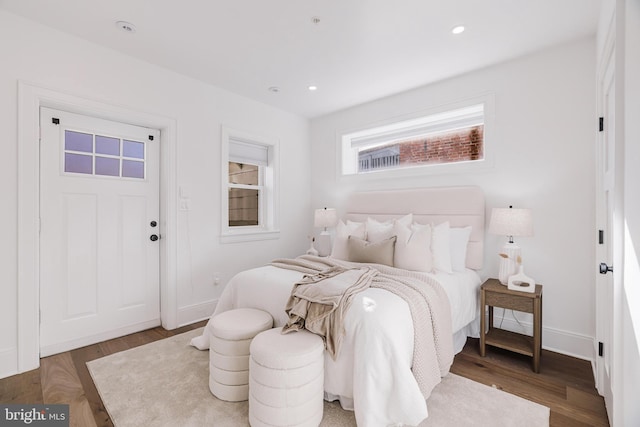 bedroom featuring dark hardwood / wood-style floors