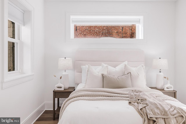 bedroom featuring wood-type flooring