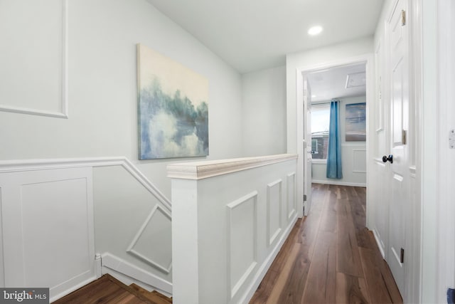 hallway with dark hardwood / wood-style floors