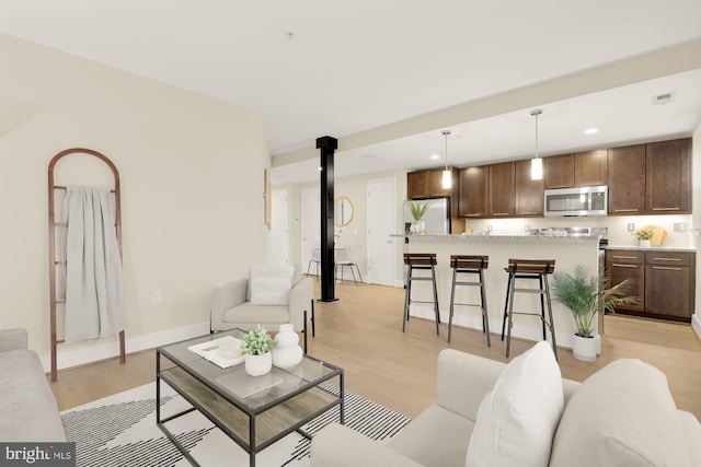 living room featuring light hardwood / wood-style floors