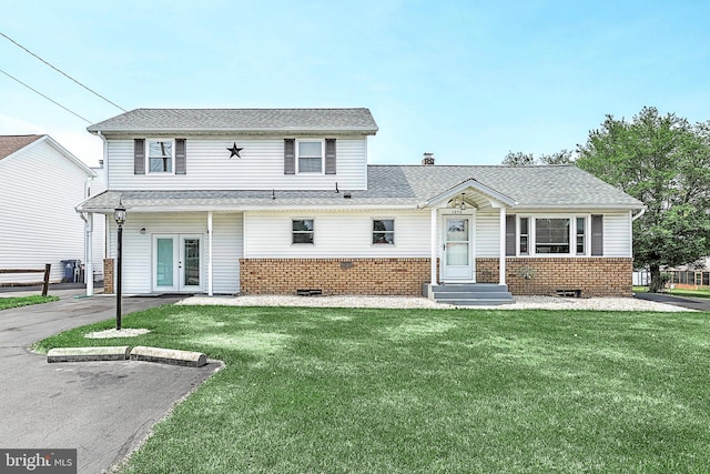 view of front of house featuring a front yard