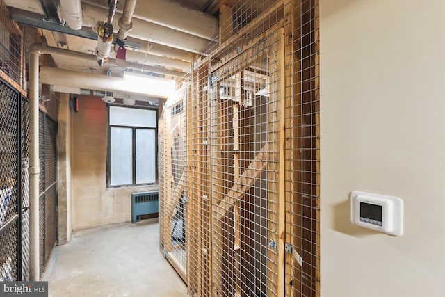 storage area featuring radiator heating unit