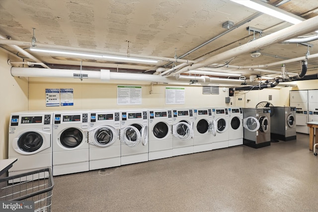 laundry area with separate washer and dryer