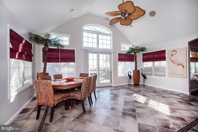 dining room with french doors, ceiling fan, and high vaulted ceiling