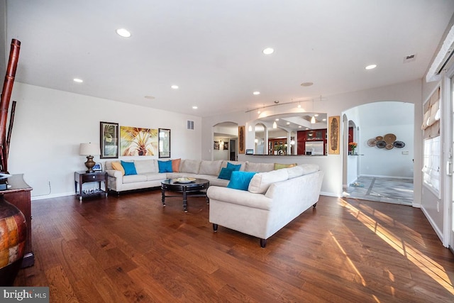 living room featuring dark hardwood / wood-style floors