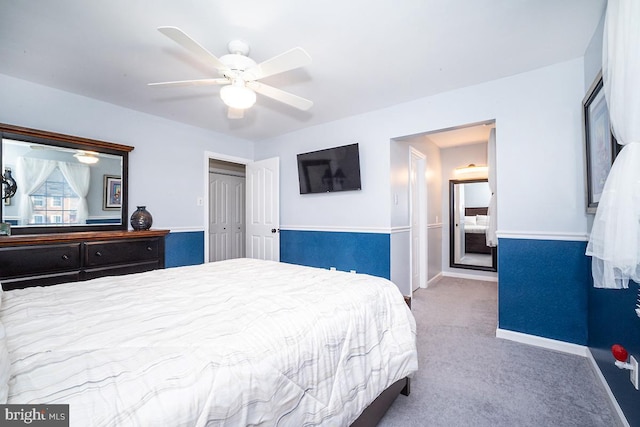 bedroom with ceiling fan and carpet