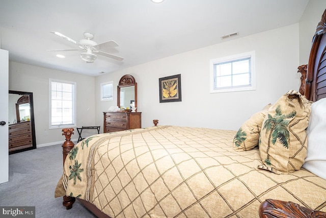 carpeted bedroom with ceiling fan