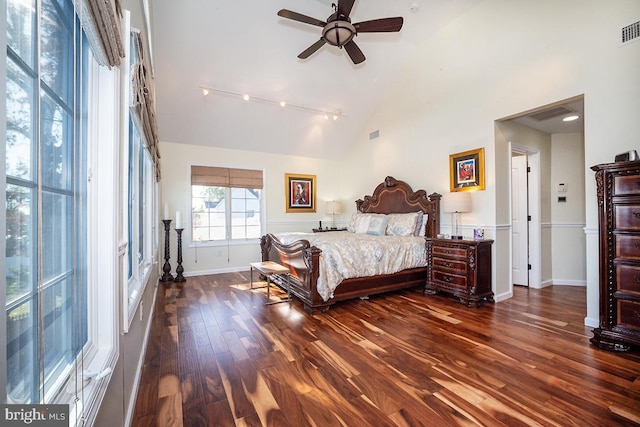 bedroom featuring ceiling fan, high vaulted ceiling, and dark hardwood / wood-style flooring