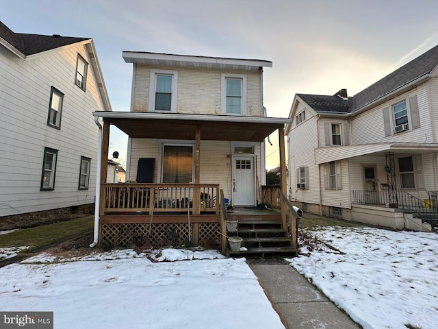 view of front of home featuring covered porch