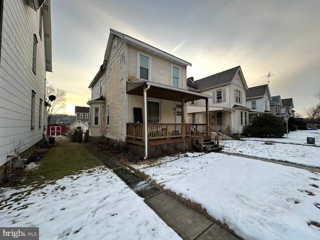 view of front of property featuring covered porch