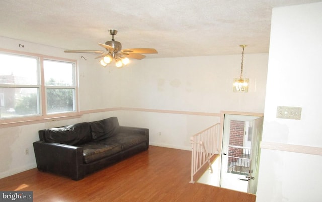 living area with hardwood / wood-style floors