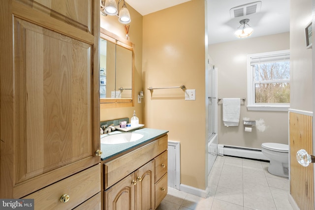 full bathroom with tile patterned flooring, enclosed tub / shower combo, vanity, baseboard heating, and toilet